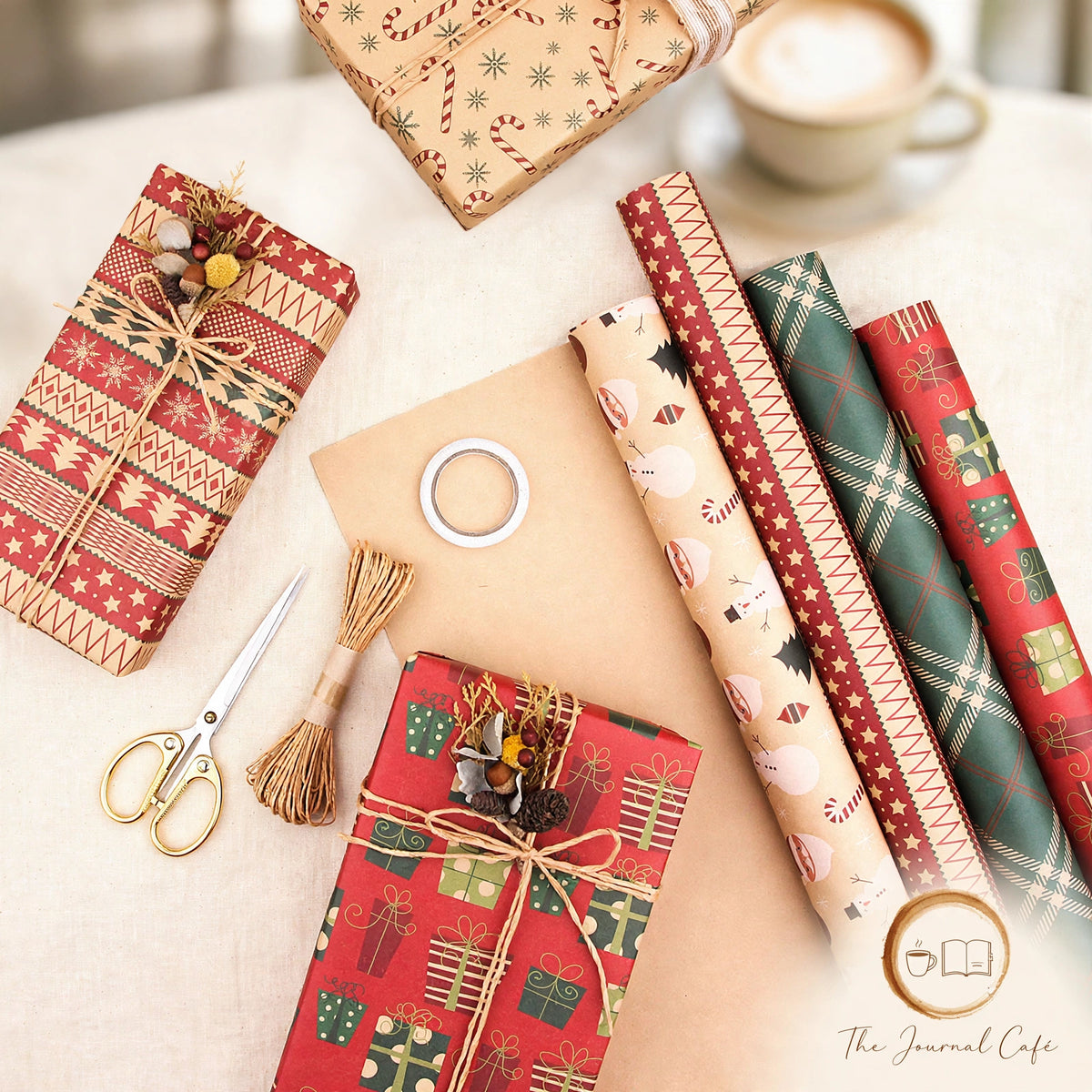 Vintage Christmas kraft wrapping paper — product photo 2 styled on a cream café table, The Journal Café