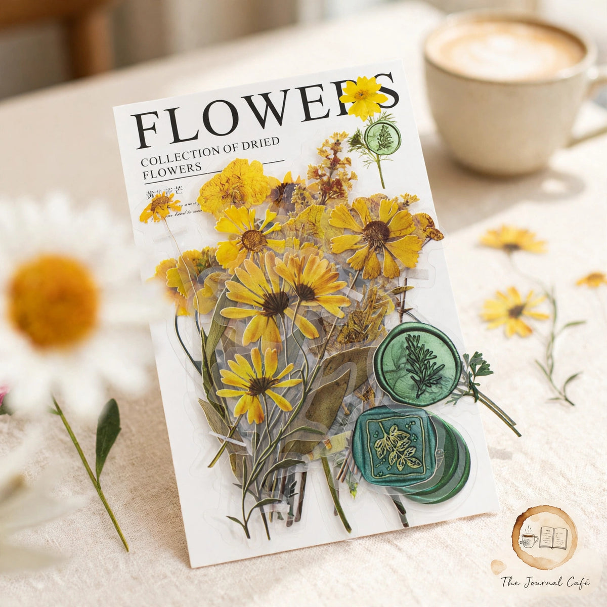 Dried flowers sticker pack — product photo 2 styled on a cream café table, The Journal Café