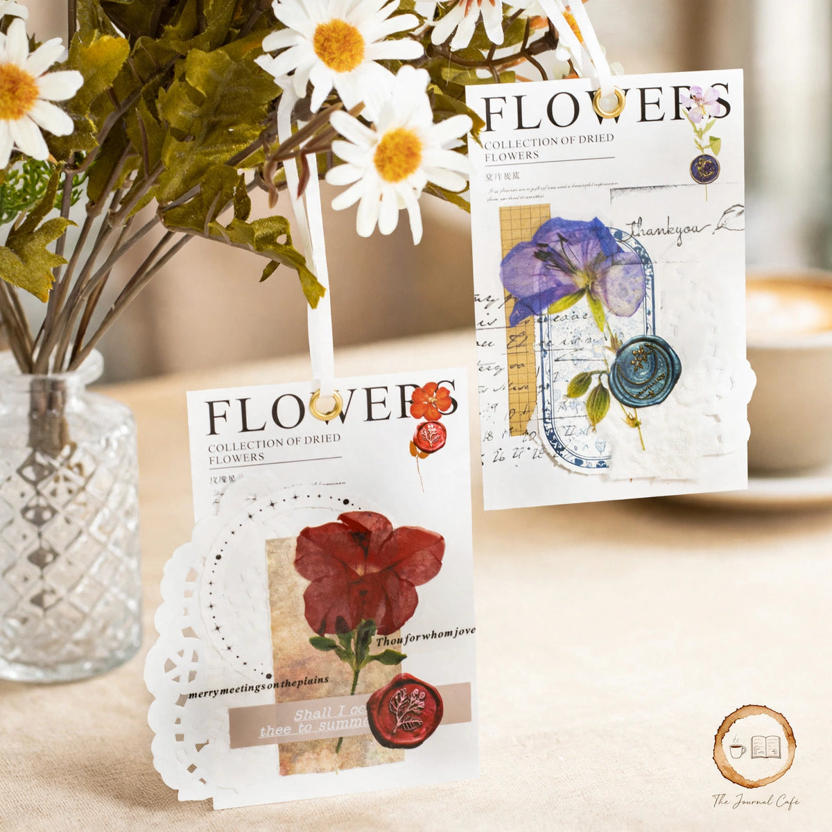 Dried flowers sticker pack — product photo 10 styled on a cream café table, The Journal Café