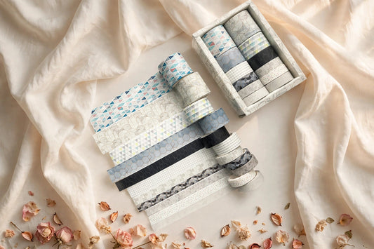 Antique Washi Tape Set — twelve boxed vintage-style rolls styled on a cream café table, The Journal Café