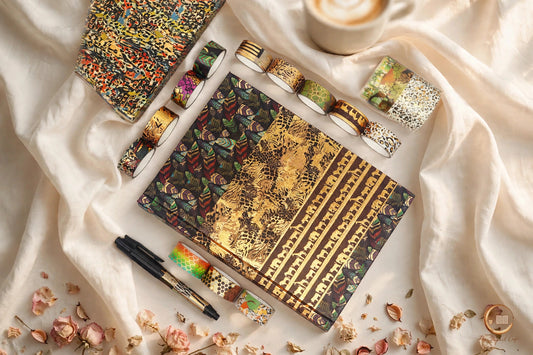 Animal Washi Tape Set — 12 rolls of animal-pattern washi tape styled on a cream café table, The Journal Café