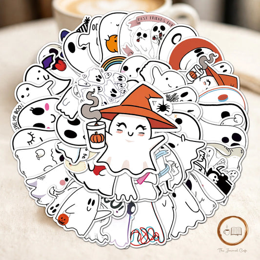 Cute Halloween Ghost Stickers — 50 cartoon ghost stickers styled on a cream café table, The Journal Café