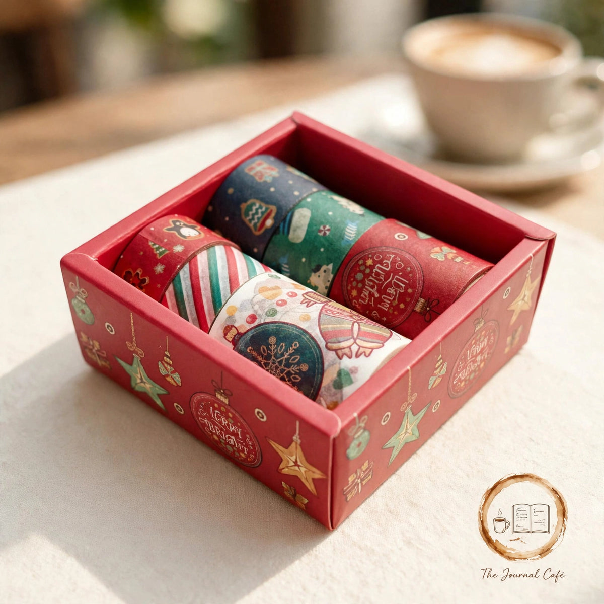 Classic Christmas washi tape — product photo 5 styled on a cream café table, The Journal Café