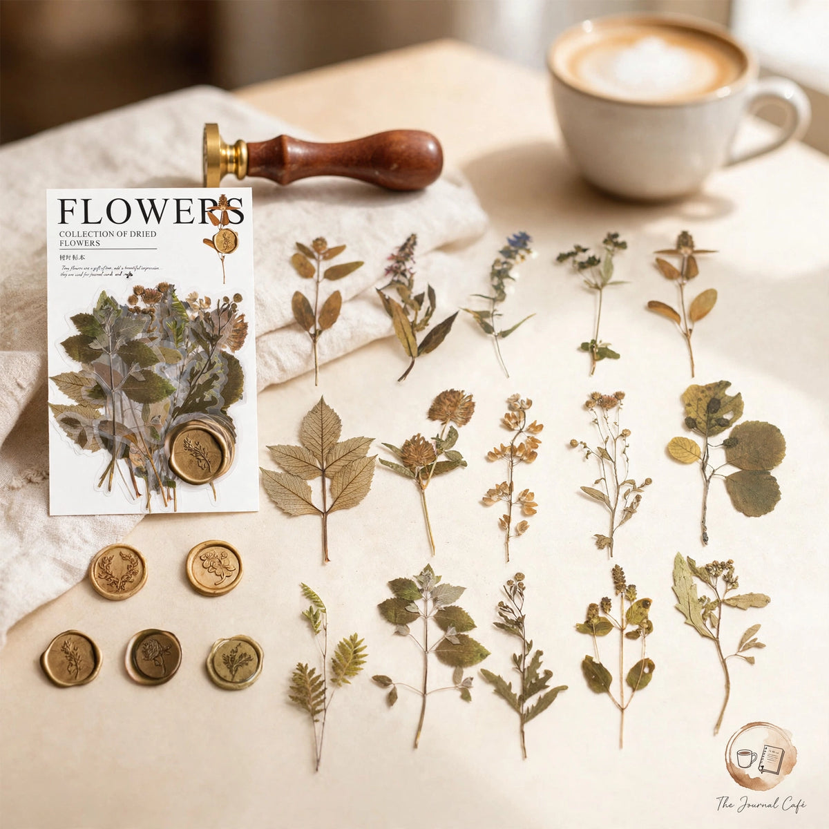 Dried flowers sticker pack — product photo 12 styled on a cream café table, The Journal Café