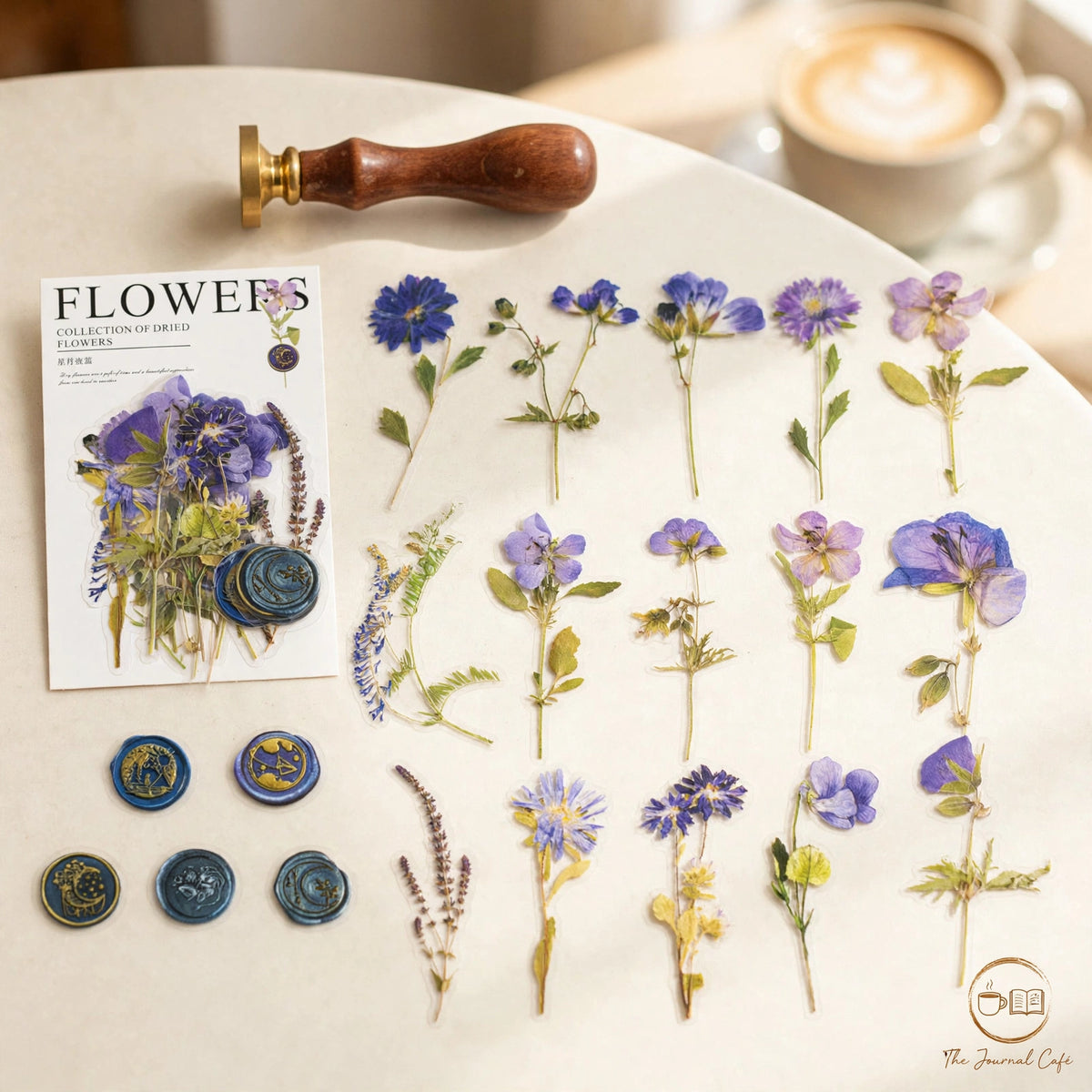 Dried flowers sticker pack — product photo 13 styled on a cream café table, The Journal Café