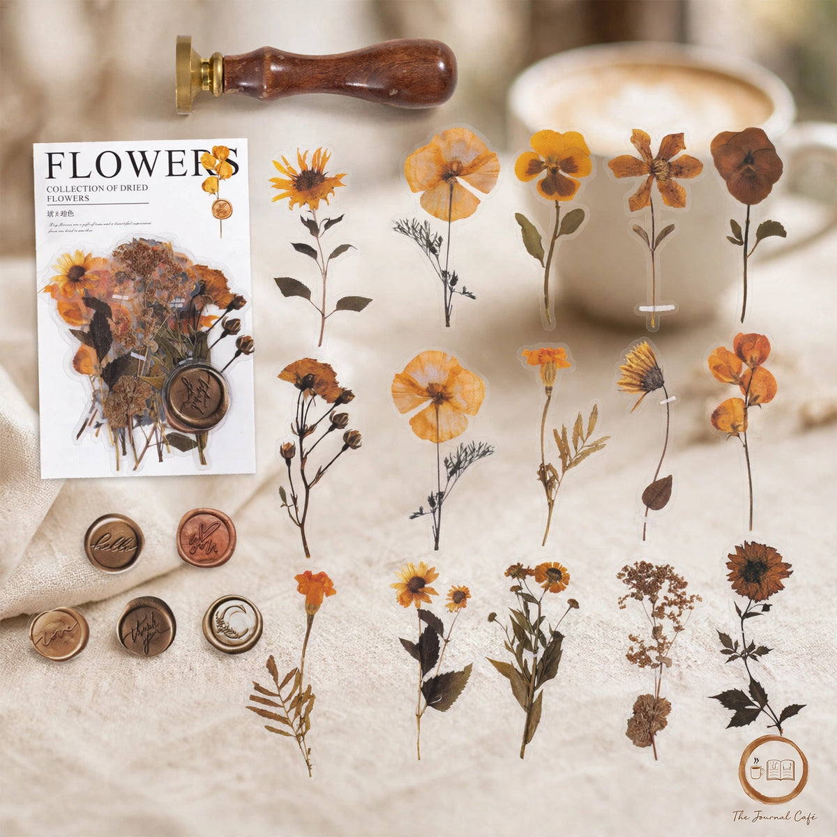 Dried flowers sticker pack — product photo 14 styled on a cream café table, The Journal Café