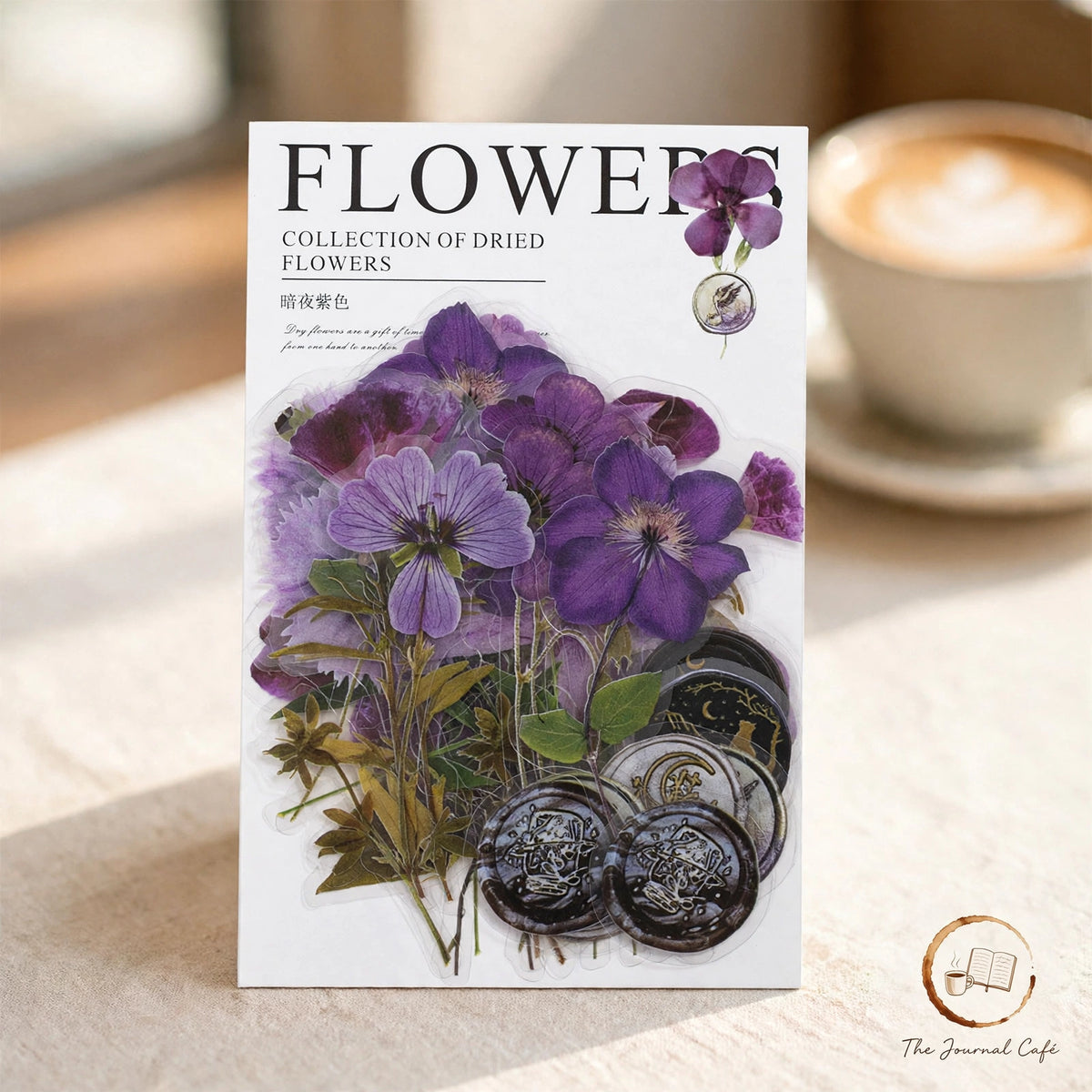 Dried flowers sticker pack — product photo 8 styled on a cream café table, The Journal Café