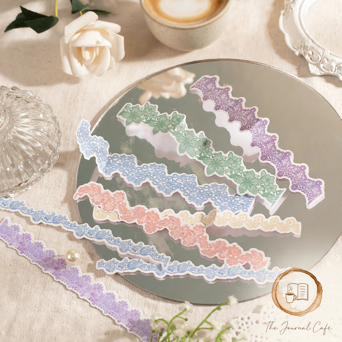 Floral lace stickers — product photo 6 styled on a cream café table, The Journal Café