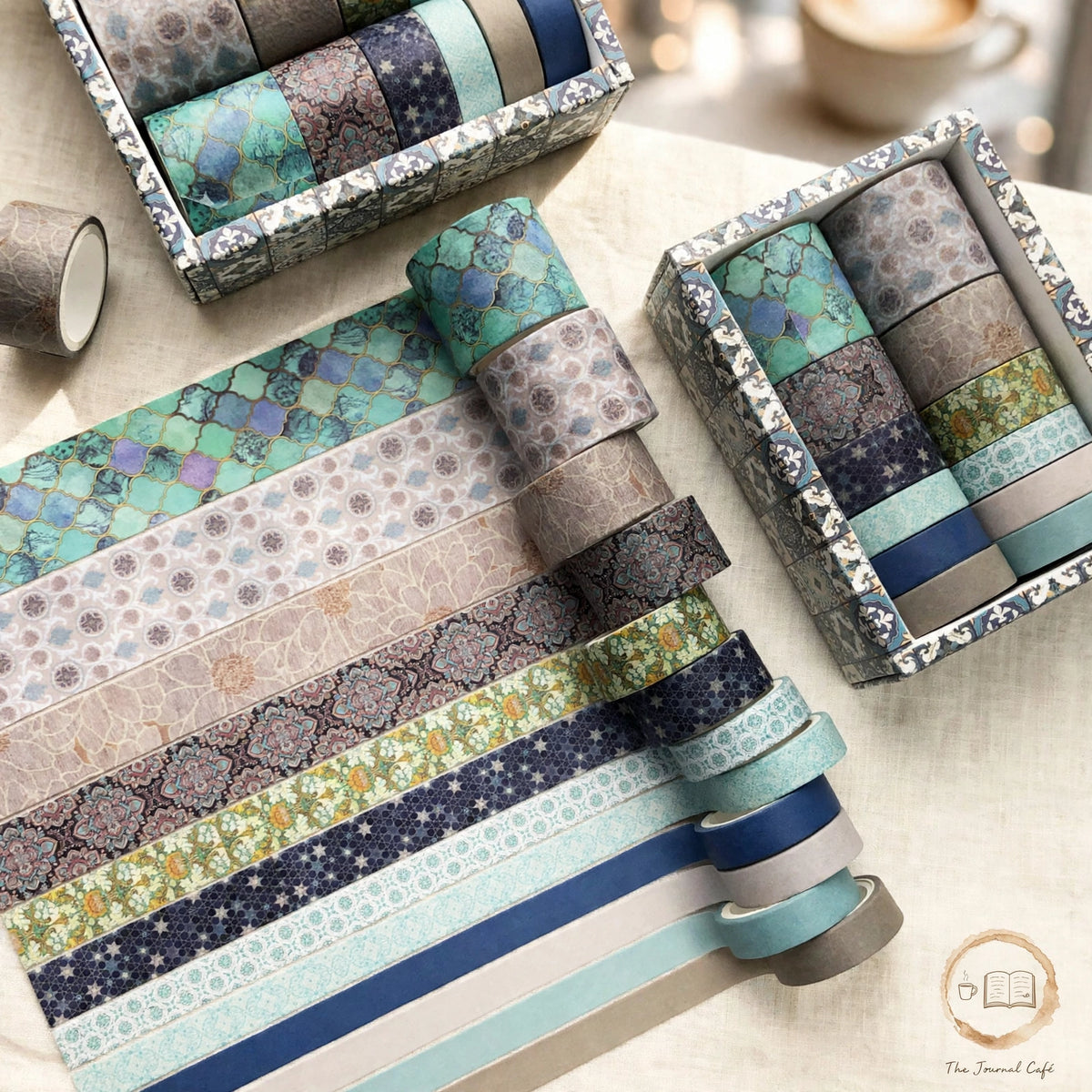 Antique washi tape set — product photo 3 styled on a cream café table, The Journal Café