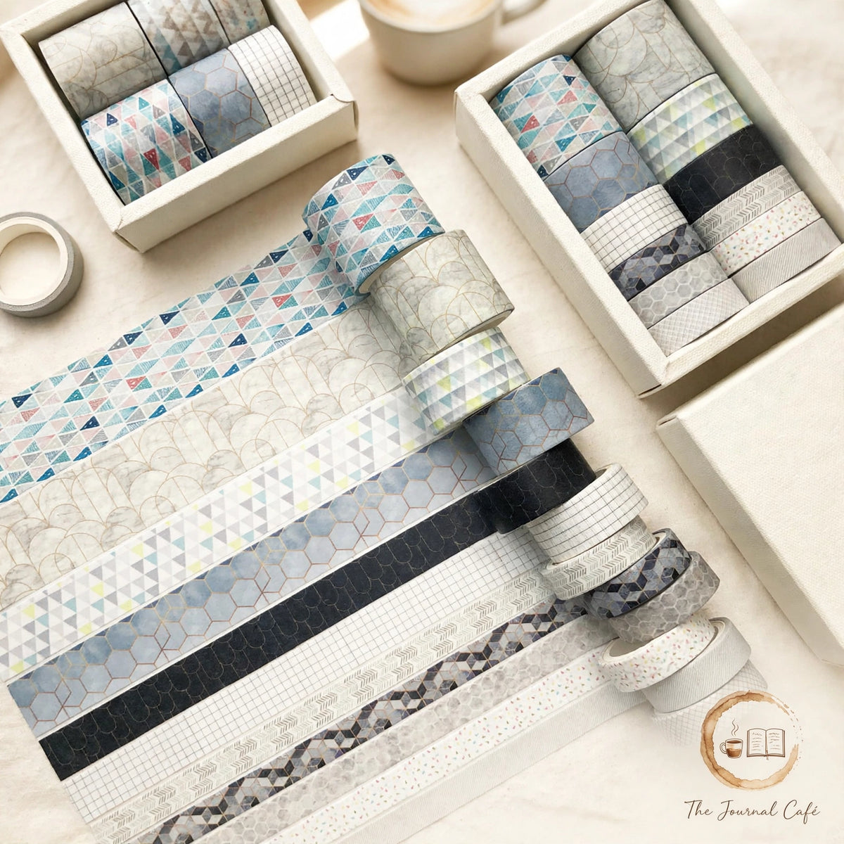 Antique washi tape set — product photo 6 styled on a cream café table, The Journal Café