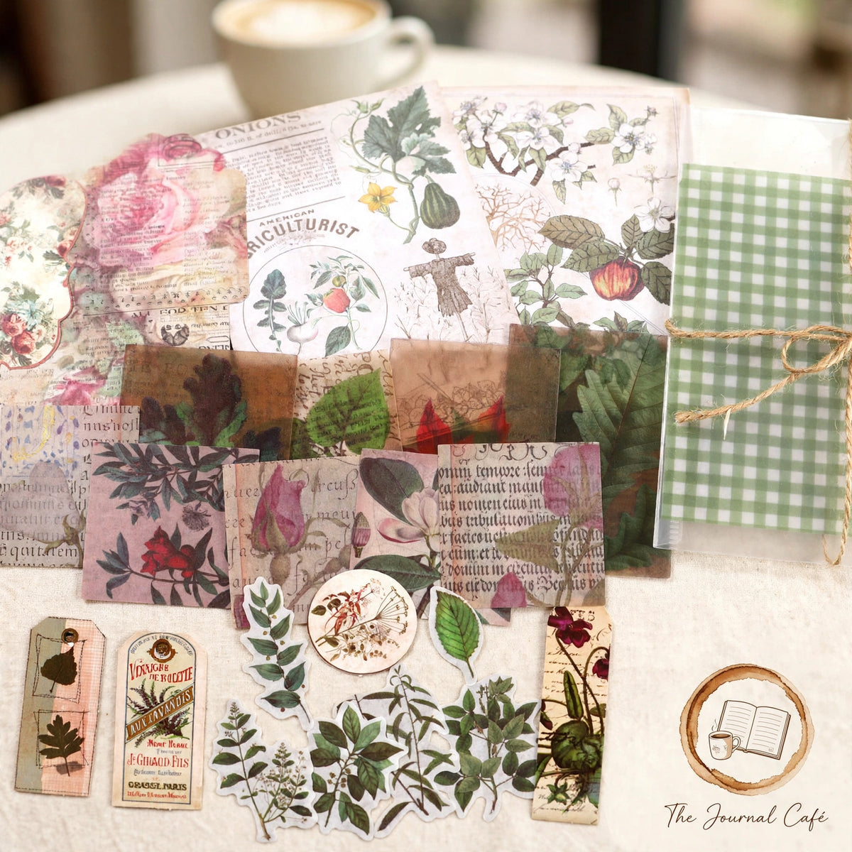 Junk journal retro material pack — product photo 3 styled on a cream café table, The Journal Café