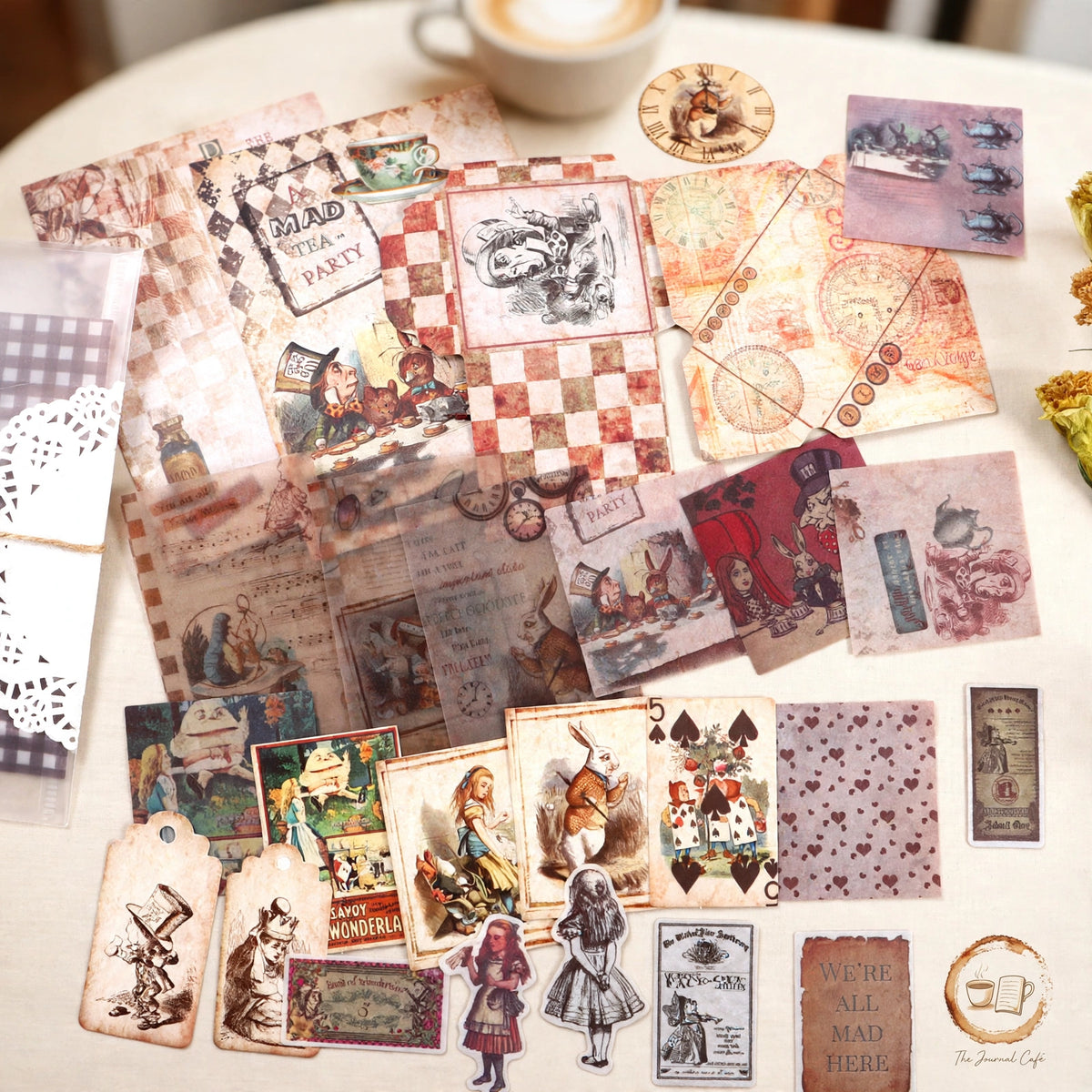 Junk journal retro material pack — product photo 6 styled on a cream café table, The Journal Café
