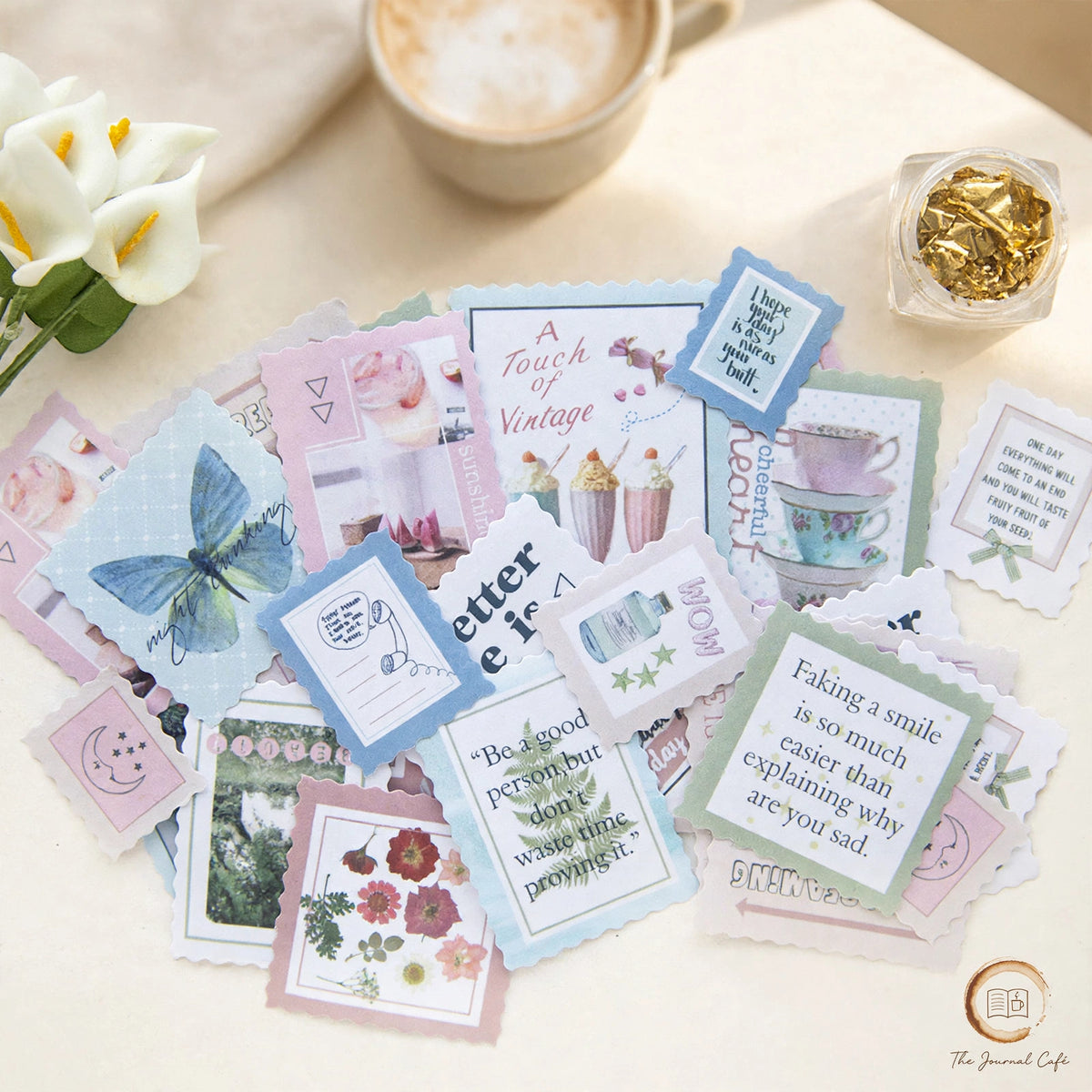 Vintage stamp sealing stickers — product photo 9 styled on a cream café table, The Journal Café