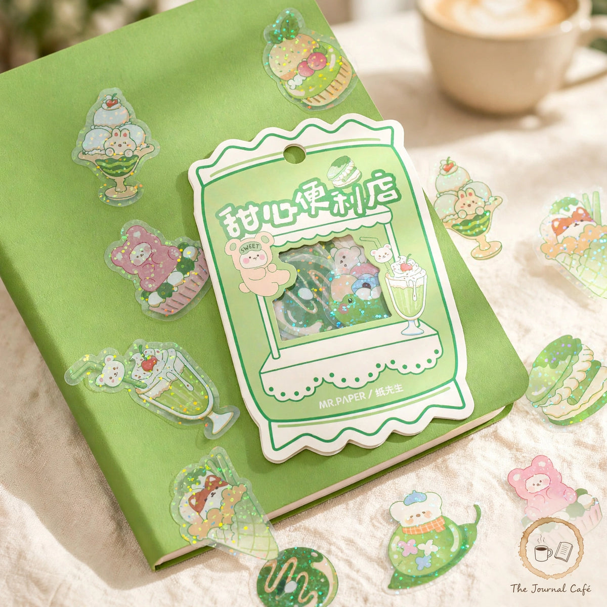 Sweetheart convenience store stickers — product photo 2 styled on a cream café table, The Journal Café