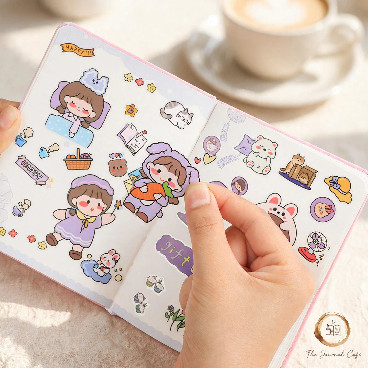 PET journal stickers — product photo 8 styled on a cream café table, The Journal Café