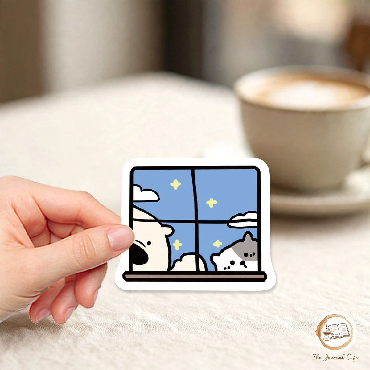 Cartoon animal hotel stickers — product photo 2 styled on a cream café table, The Journal Café