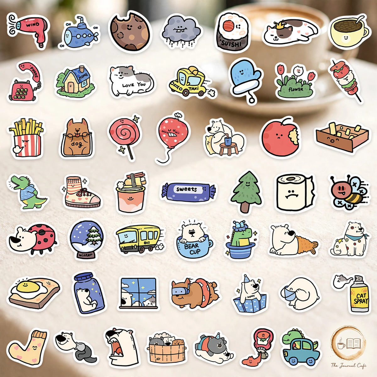 Cartoon animal hotel stickers — product photo 11 styled on a cream café table, The Journal Café