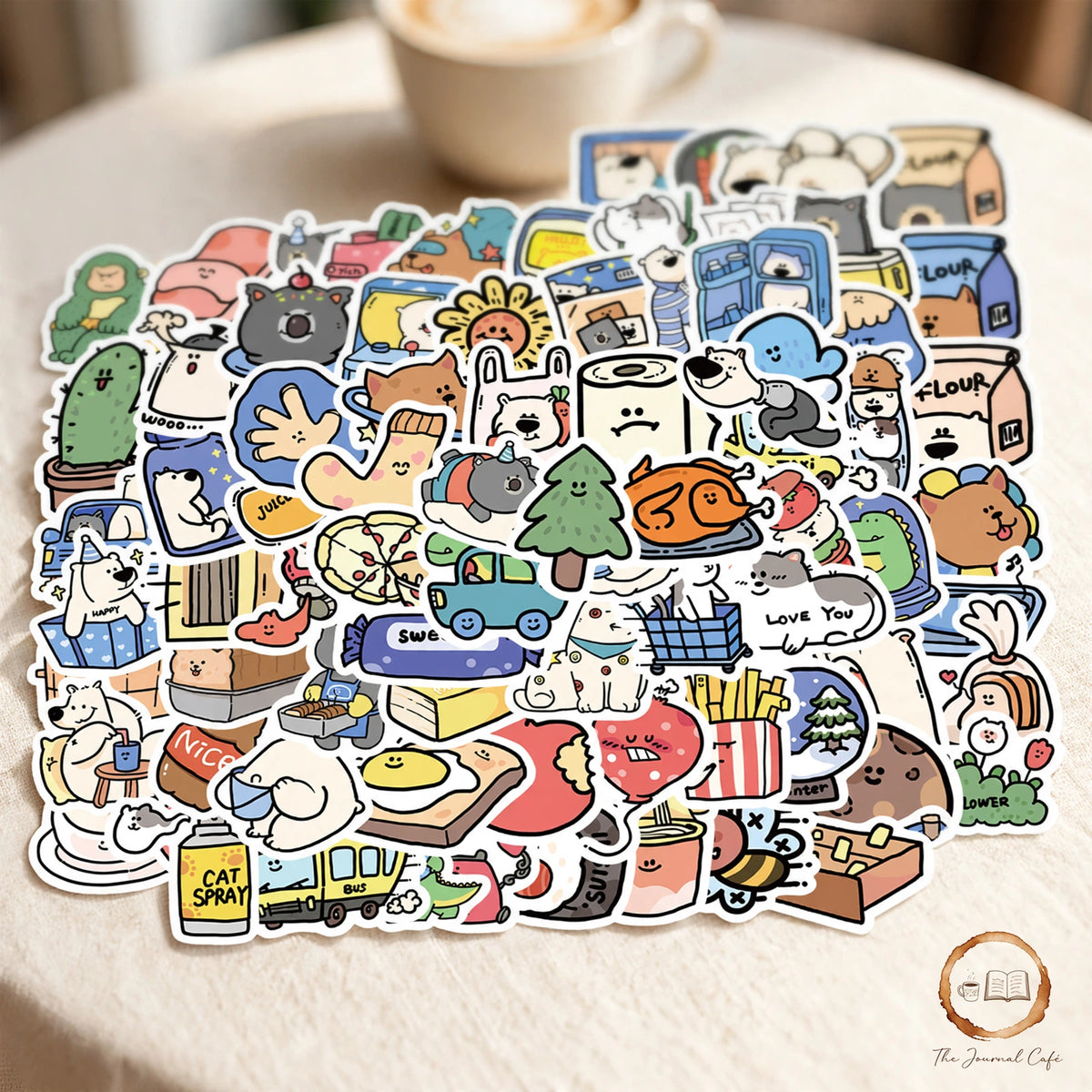 Cartoon animal hotel stickers — product photo 8 styled on a cream café table, The Journal Café