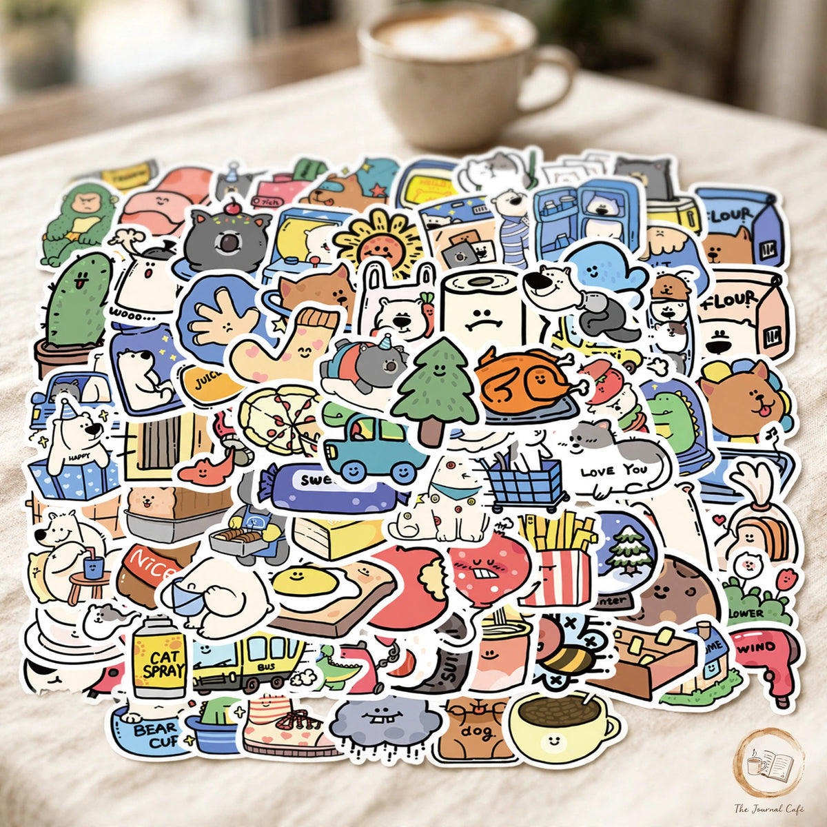 Cartoon animal hotel stickers — product photo 10 styled on a cream café table, The Journal Café