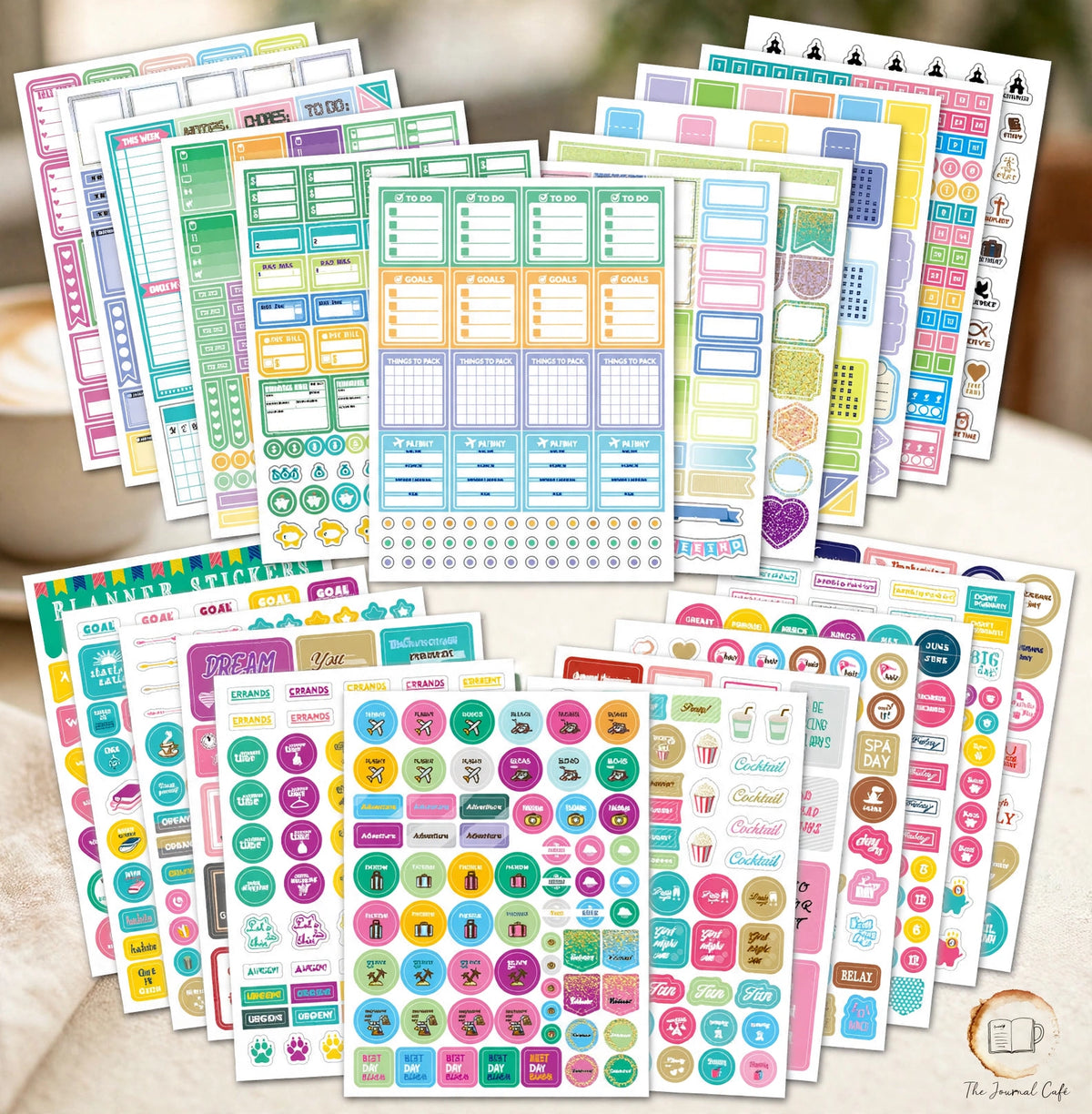 Seasonal monthly planner stickers — product photo 3 styled on a cream café table, The Journal Café