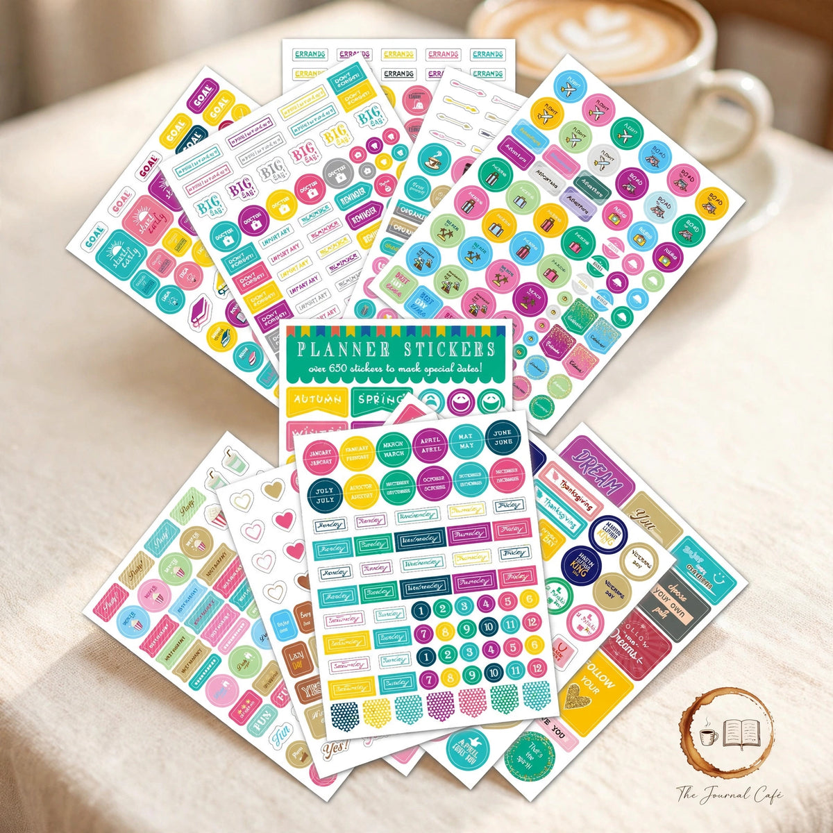 Seasonal monthly planner stickers — product photo 5 styled on a cream café table, The Journal Café