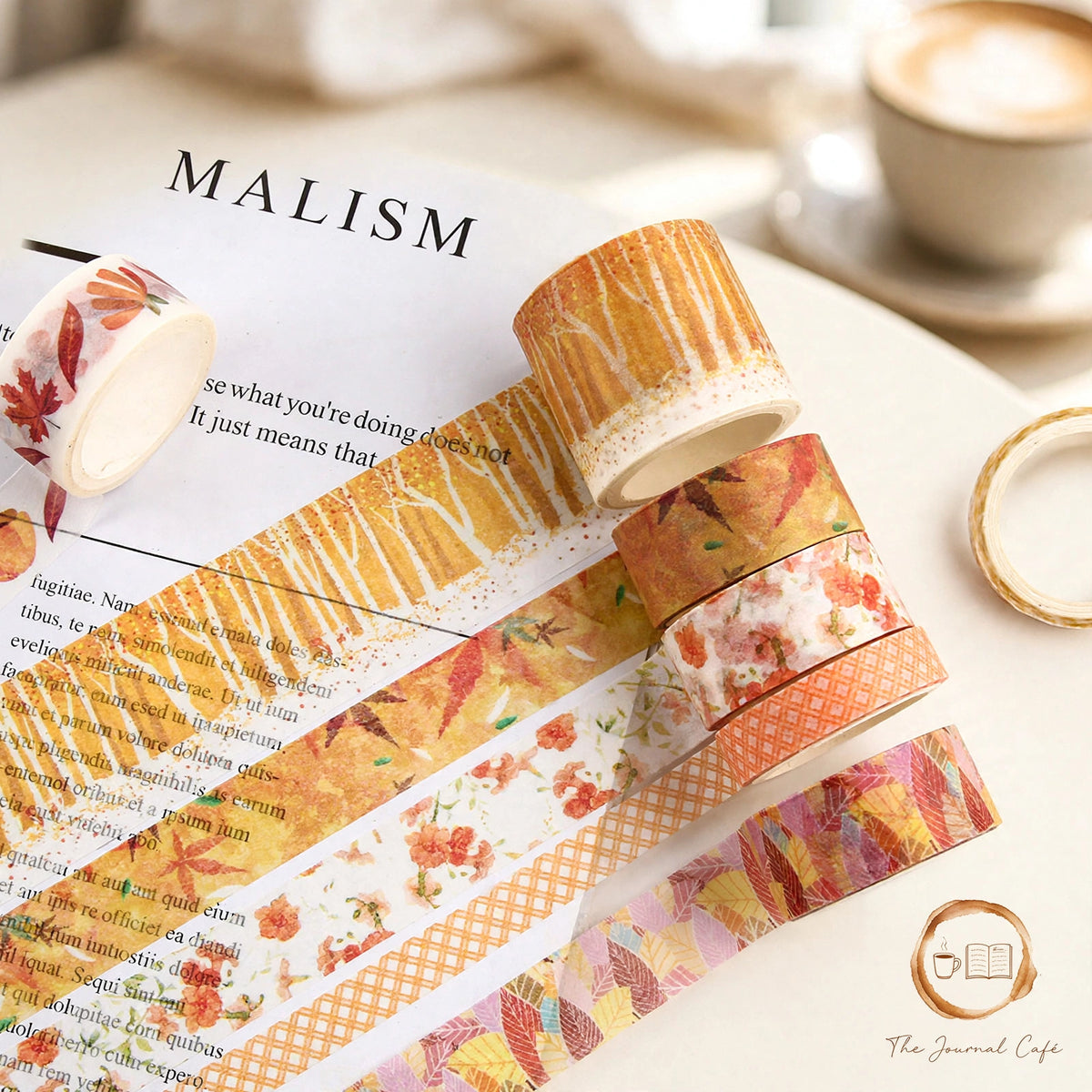 Slim washi tape set — product photo 4 styled on a cream café table, The Journal Café