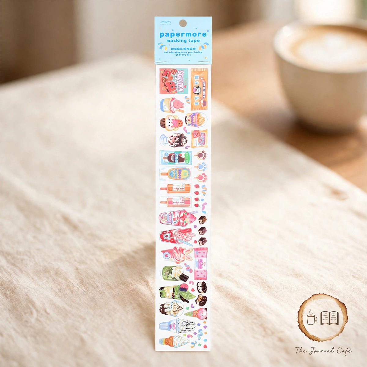 Sweet Store PET tape — product photo 3 styled on a cream café table, The Journal Café