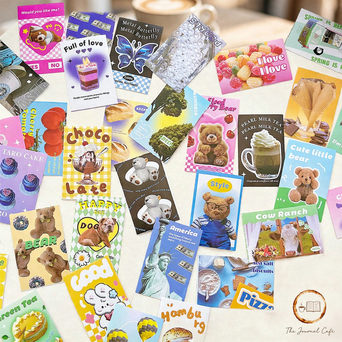 American retro mini sticker book — product photo 2 styled on a cream café table, The Journal Café