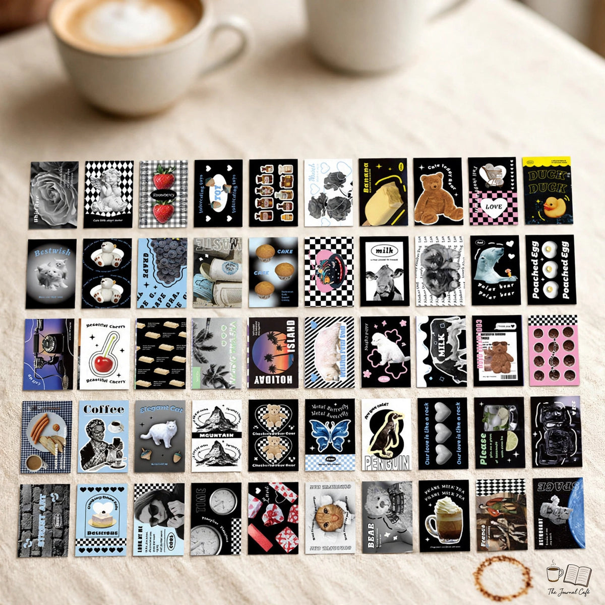 American retro mini sticker book — product photo 7 styled on a cream café table, The Journal Café