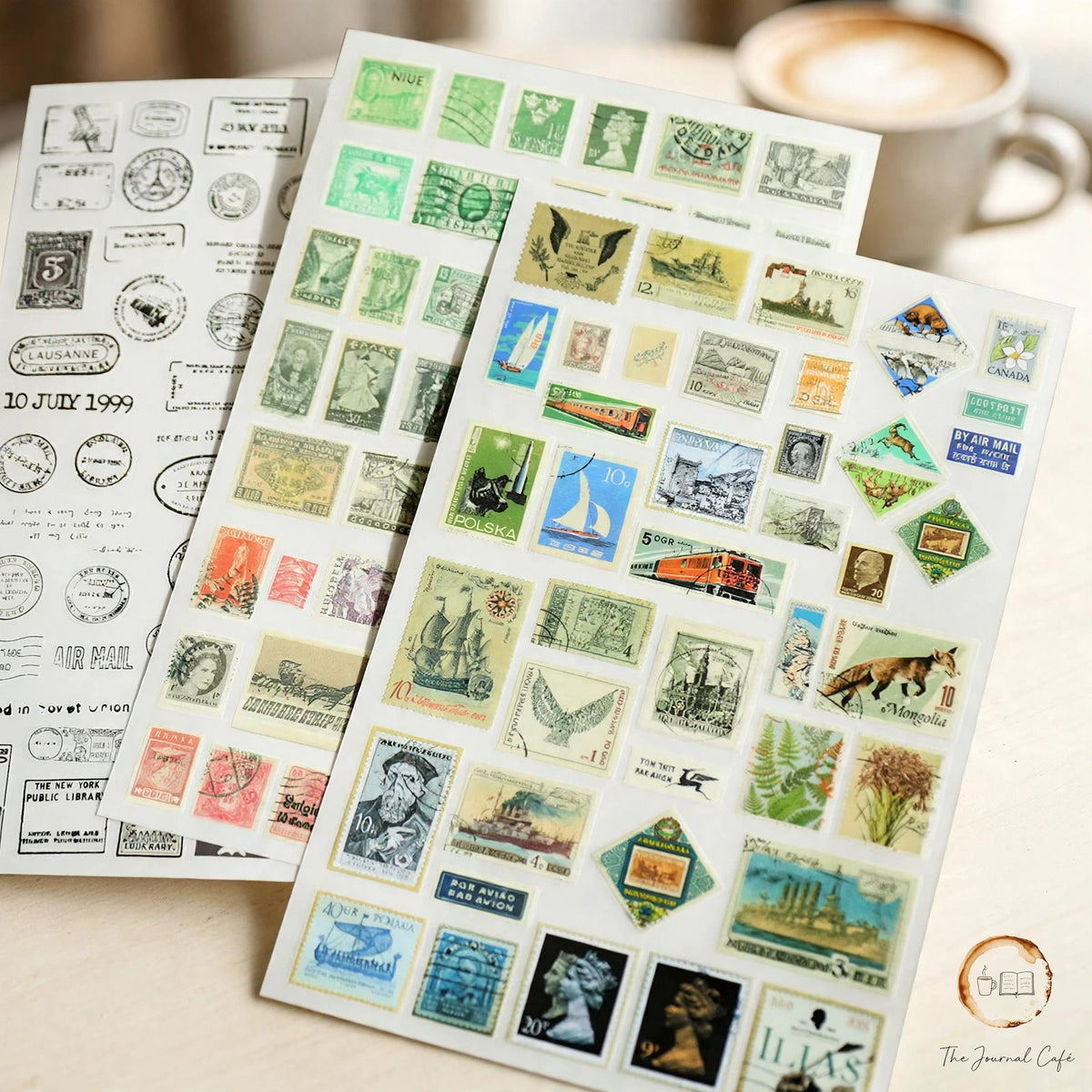 Rub on transfer stickers — product photo 2 styled on a cream café table, The Journal Café