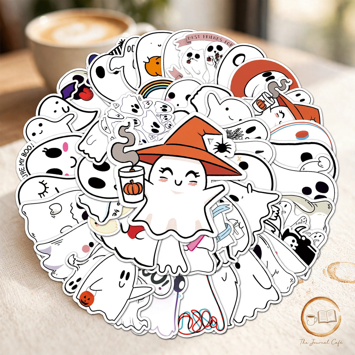 Cute Halloween ghost stickers — product photo 2 styled on a cream café table, The Journal Café