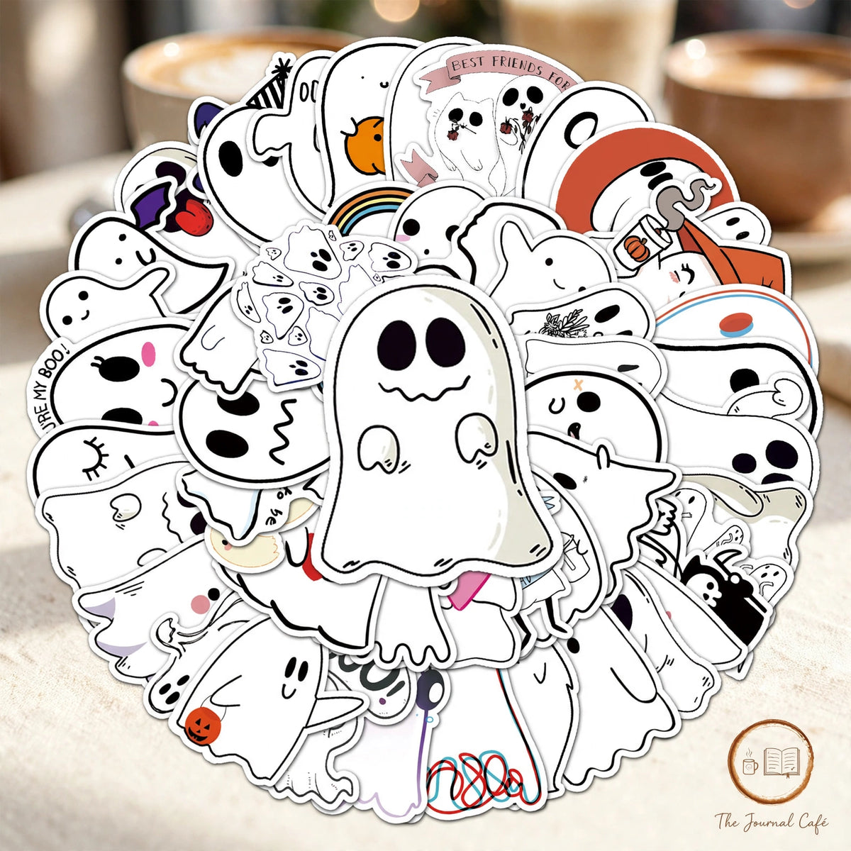 Cute Halloween ghost stickers — product photo 5 styled on a cream café table, The Journal Café