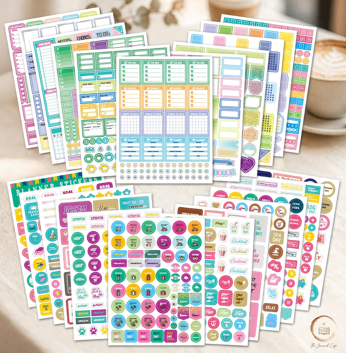 Monthly planner stickers 12 sheets — product photo 2 styled on a cream café table, The Journal Café
