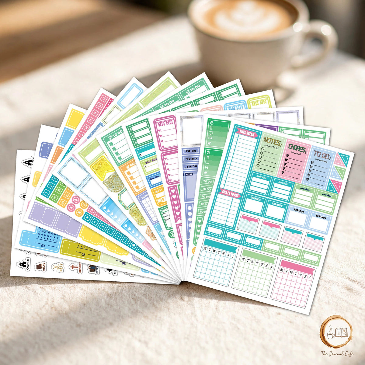 New Year calendar plan stickers — product photo 5 styled on a cream café table, The Journal Café
