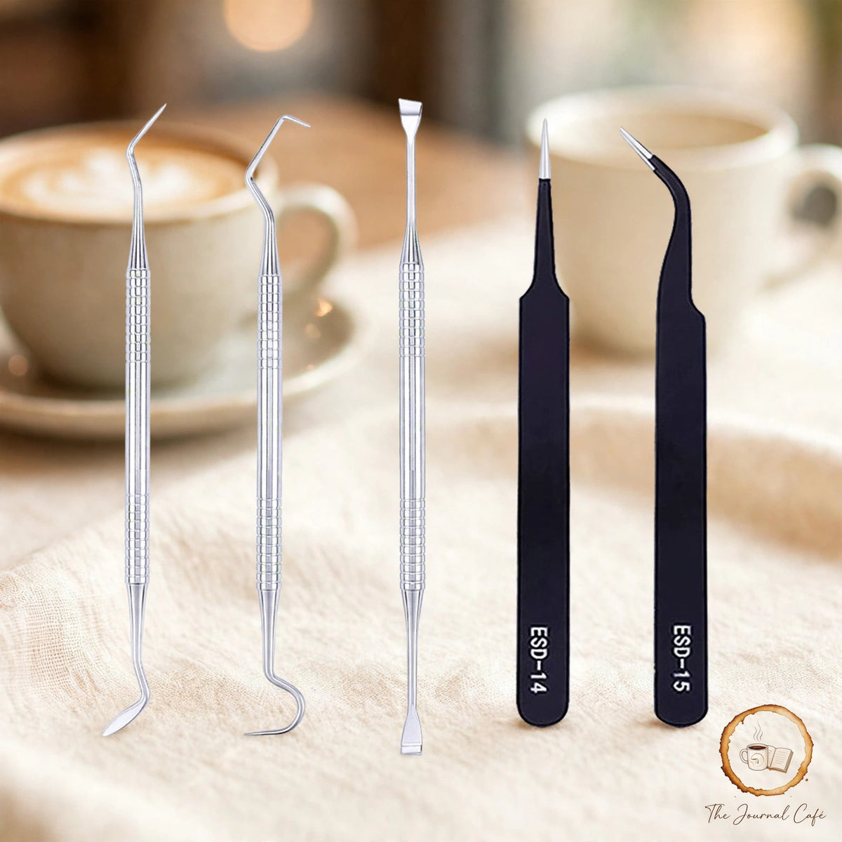 5-piece vinyl sticker tool set — product photo 3 styled on a cream café table, The Journal Café
