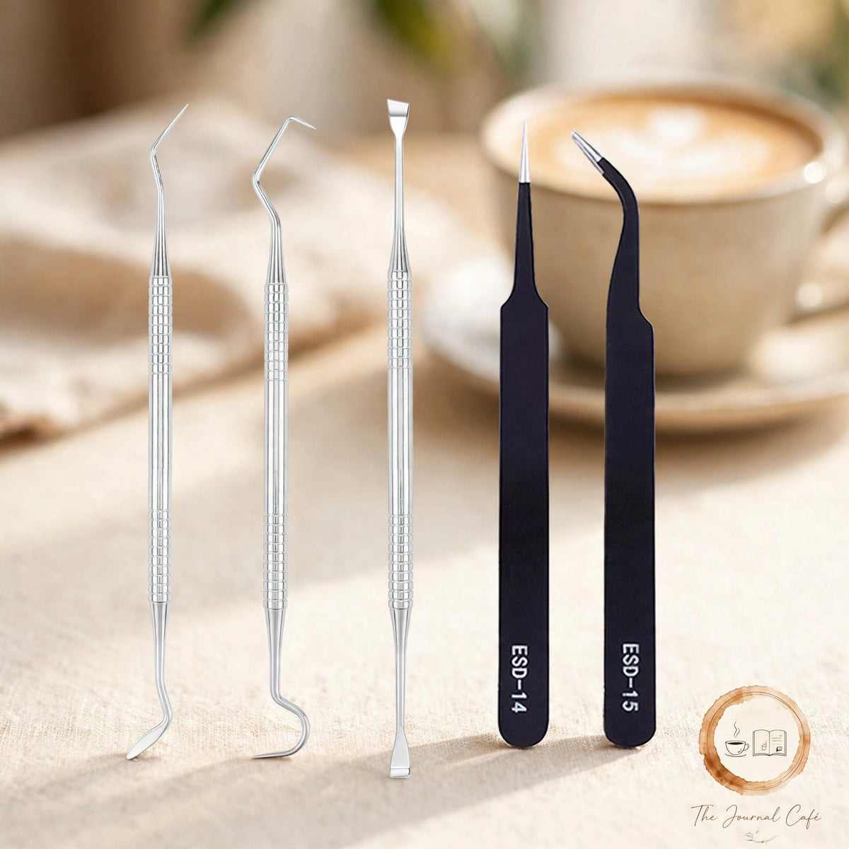 5-piece vinyl sticker tool set — product photo 7 styled on a cream café table, The Journal Café