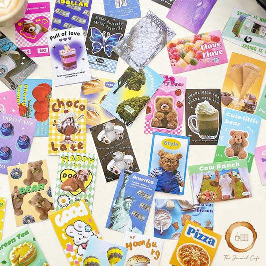 American retro mini sticker book — colorful retro cartoon sticker sheets on a cream café table, The Journal Café